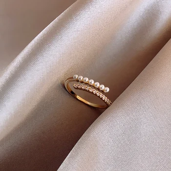 Корейската мода бижута прост и изтънчен мед инкрустиран циркон перлена пръстен отваряне регулируема женски ежедневно пръстен